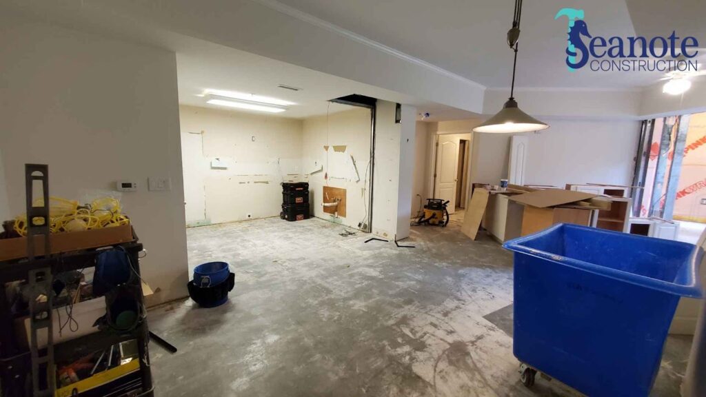 Room under construction with tools and materials.