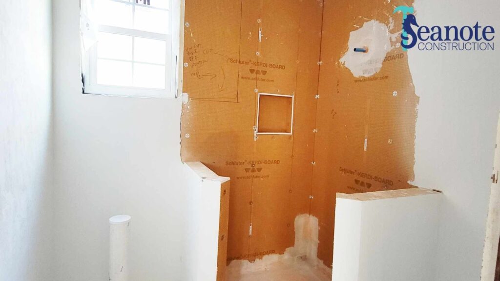 Bathroom renovation in progress, Schluter-KERDI-BOARD installation.