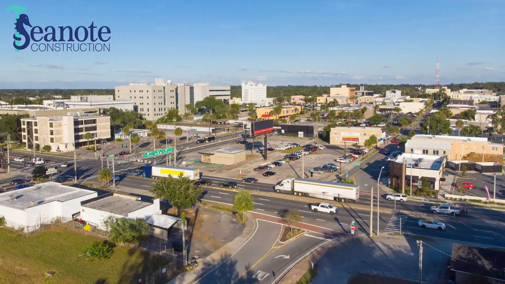 Aerial view of busy city intersection with trucks in Ocala, Florida
