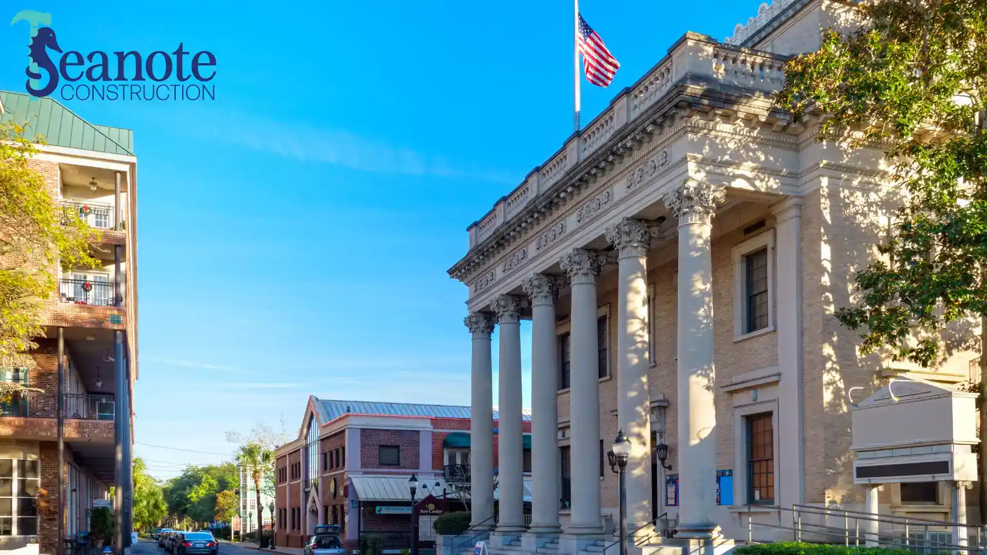 Historic courthouse with columns and American flag in gainesville florida